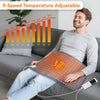 A man is using a 9-speed temperature adjustable electric heating pad on his lap while relaxing on a sofa.