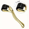 A gold-toned titanium micro derma roller tool with a textured head shown next to an inset detail.