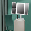 A foldable LED makeup mirror is displayed on a stand, showing three mirrored sections.