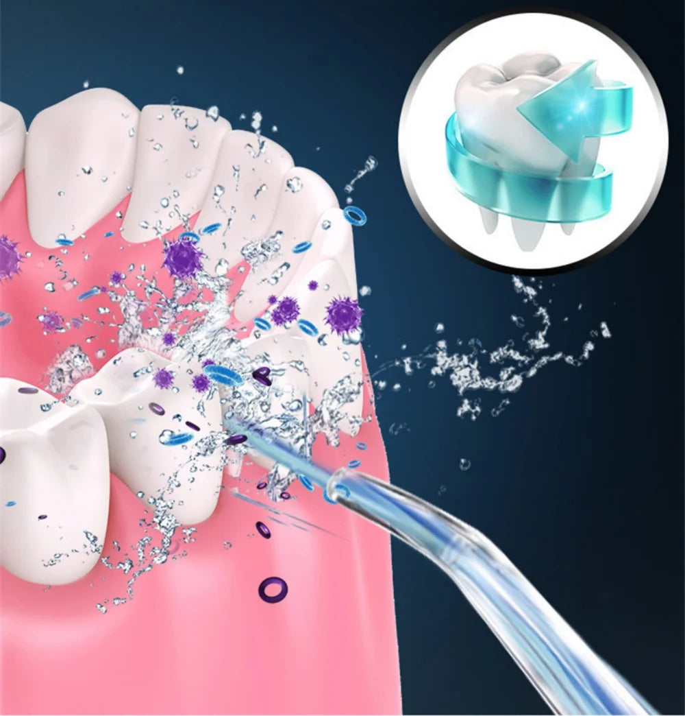 A close-up of a pink molar with water spray and a dental cleaning device being used for oral irrigation.