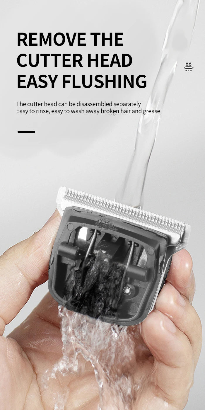 A hand is flushing a disassembled cutter head of an electric hair clipper under running water.