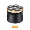 A gold and black electric rechargeable hair trimmer with multiple grooming attachments.