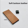 A rectangular piece of soft bottom leather used as a sharpening strop, shown next to a small black block.