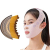 A woman is wearing a pink lymphatic sculpting bandage mask and has a yellow massage brush next to her face.
