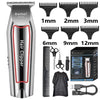 A silver electric hair clipper with various guard attachments for grooming.