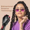 A woman is shown using a black electric twist braiding tool on her hair.