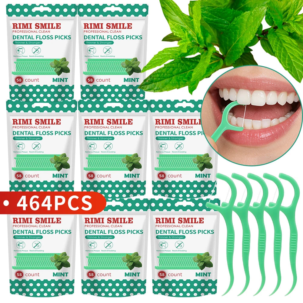 Pack of 15 dental floss picks in mint flavor with a green portable case and fresh mint leaves