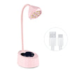A pink professional UV LED nail lamp with a flexible arm and a light panel.
