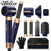 A collection of Ukliss hair styling tools including a dryer brush, curling iron, and straightener set.