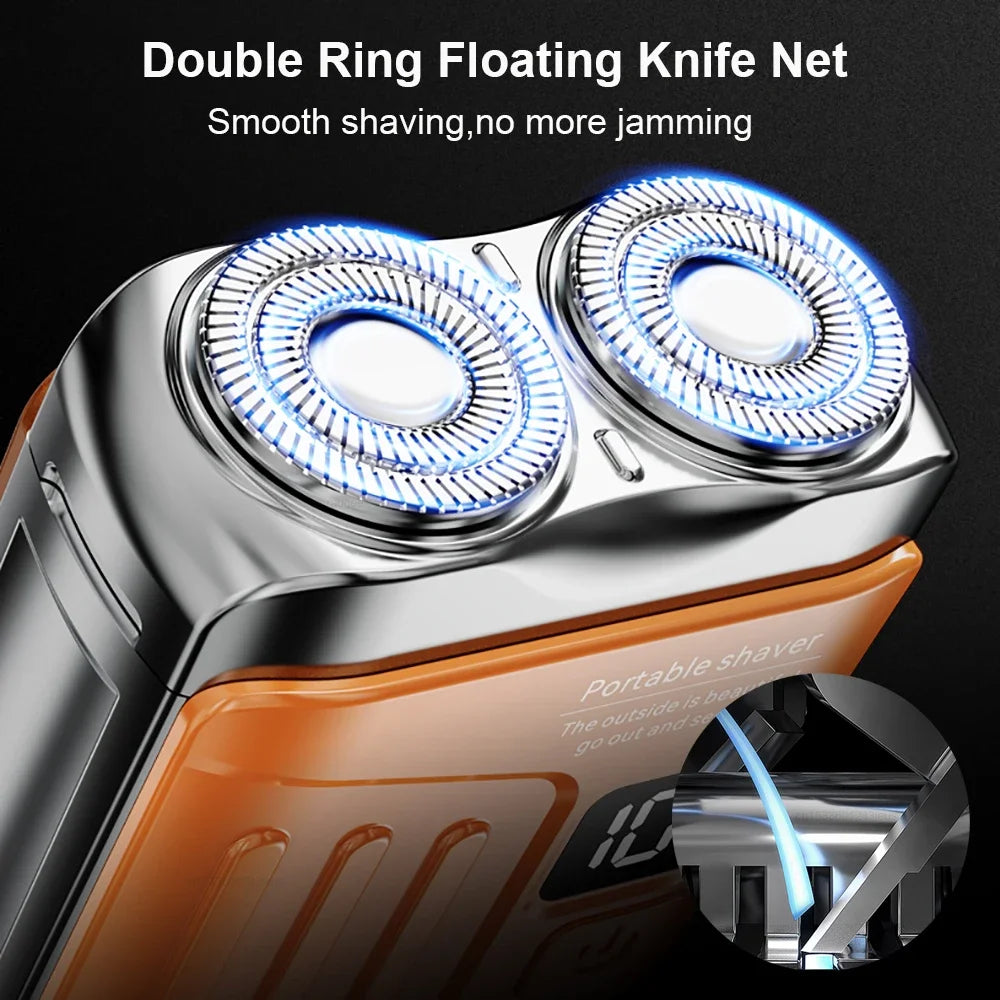 Close-up of a silver portable shaver with double ring floating knife nets visible on the head.