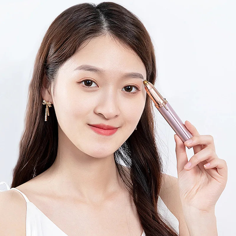 A woman holds a precision electric eyebrow trimmer in her hand against a white background.