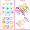 A collection of colorful butterfly hair pins and flower claw clips for children