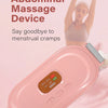 A pink heated abdominal massage device is shown next to a flower and a piece of fabric.