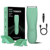 A green body hair trimmer kit shown with the box, a handheld trimmer, and multiple trimming guards.