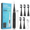 A black electric tooth cleaner device with a cleaning tip and charger is shown next to its packaging.