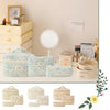 A collection of quilted cotton makeup bags in light blue and beige tones displayed on a wooden surface.