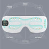 A white smart eye massager device shown with various acupoints and airbag locations marked on its surface.