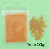 A clear plastic bag contains 10 grams of small, round, orange-colored beads used for nail art decorations.