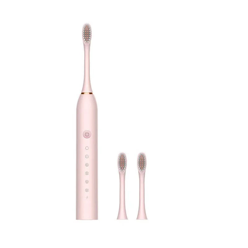 A pink sonic electric toothbrush with a handle and brush head shown vertically.