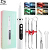 A white ultrasonic electric tooth cleaner device with various modes and cleaning tools displayed on a green box.