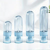 A row of four clear glass bottles with blue caps and spray nozzles, showing different sizes.