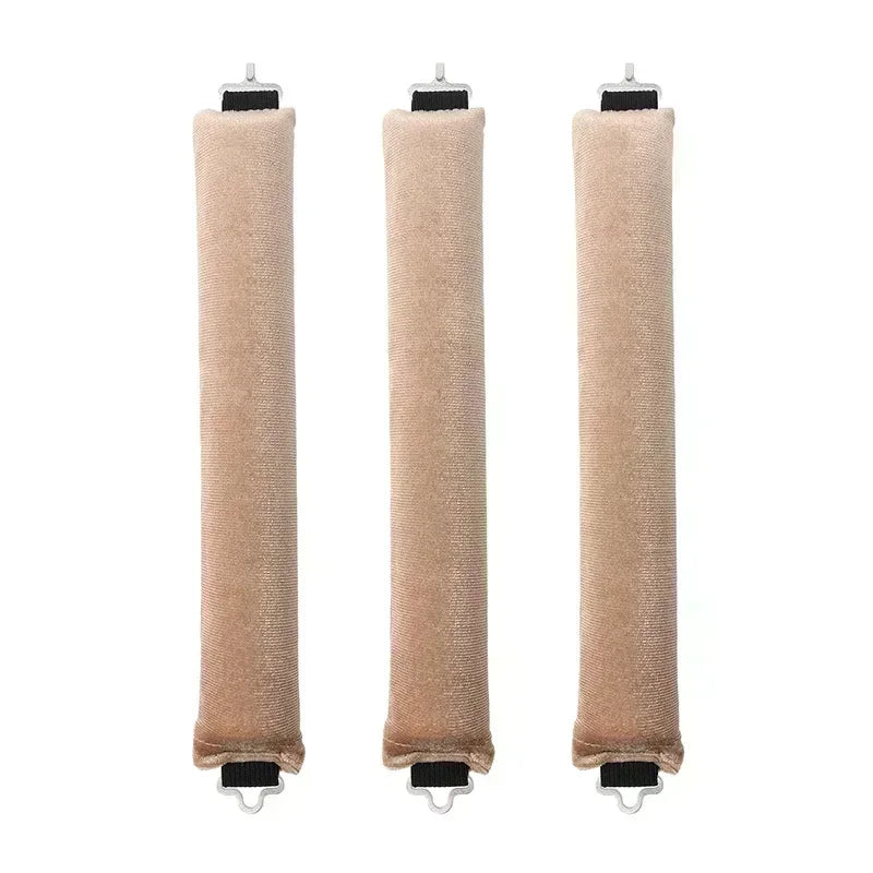 Three rolls of heatless hair curler curling rods in a nude or light brown color.