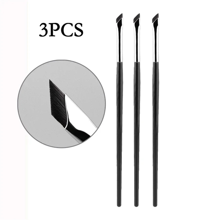 A set of three black precision eyeliner application brushes.