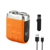 An orange and silver dual-head electric shaver with a digital display showing 92% battery level.