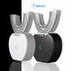 A pair of ultrasonic electric toothbrushes, one white and one black, are shown with their brush heads visible.