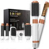 Ein Set aus fünf abnehmbaren Haarbürsten zum Styling und Trocknen in Schwarz und Kupfer, neben der Verpackung.