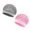 A pair of reversible satin wrap caps or bonnets for hair and sleeping in gray and pink.