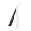 A white folding shaving razor with a black speckled handle and silver blade.