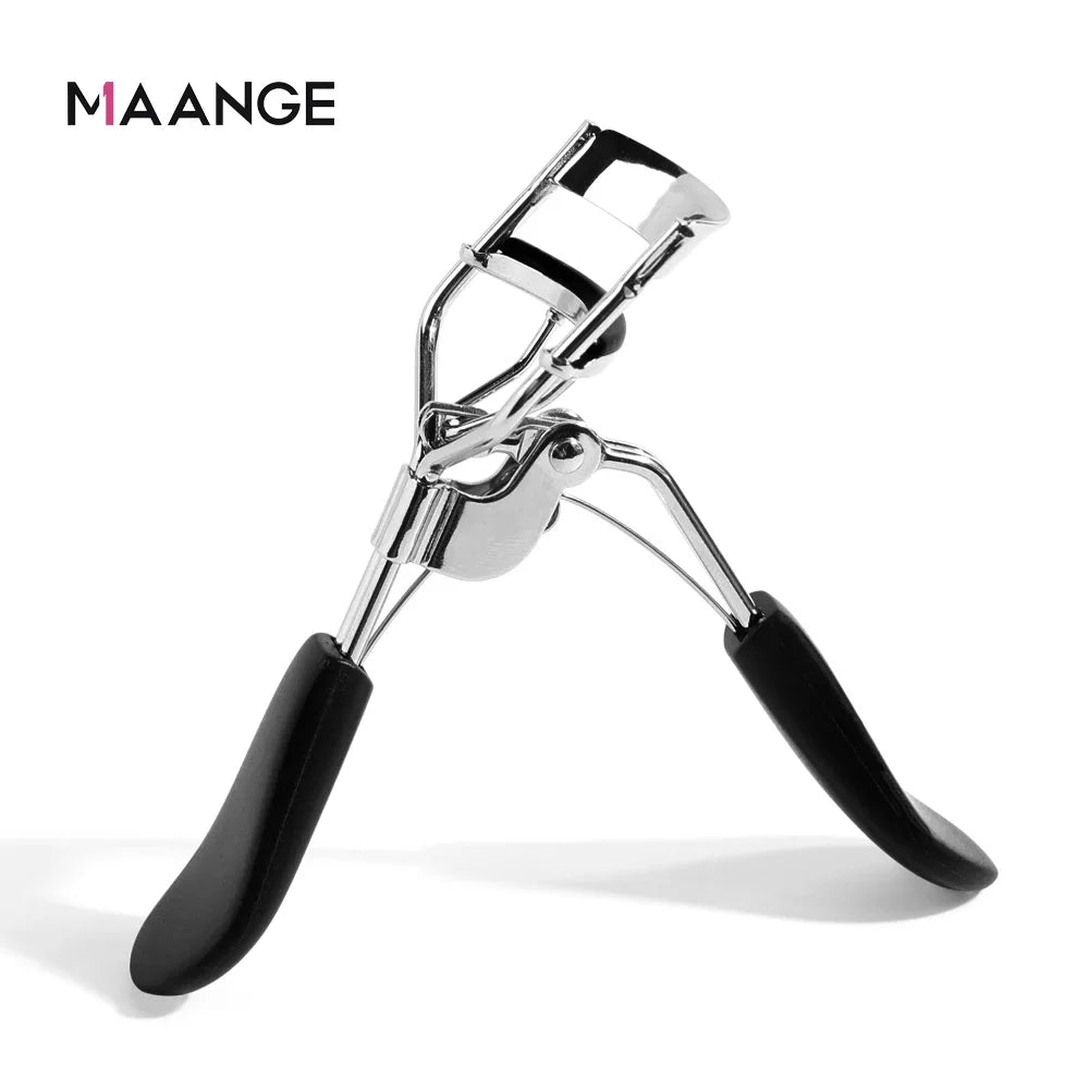 A silver makeup eyelash curler with black handles shown against a white background.