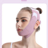 A woman is wearing a pink V-Line face slimming lifting bandage on her face.