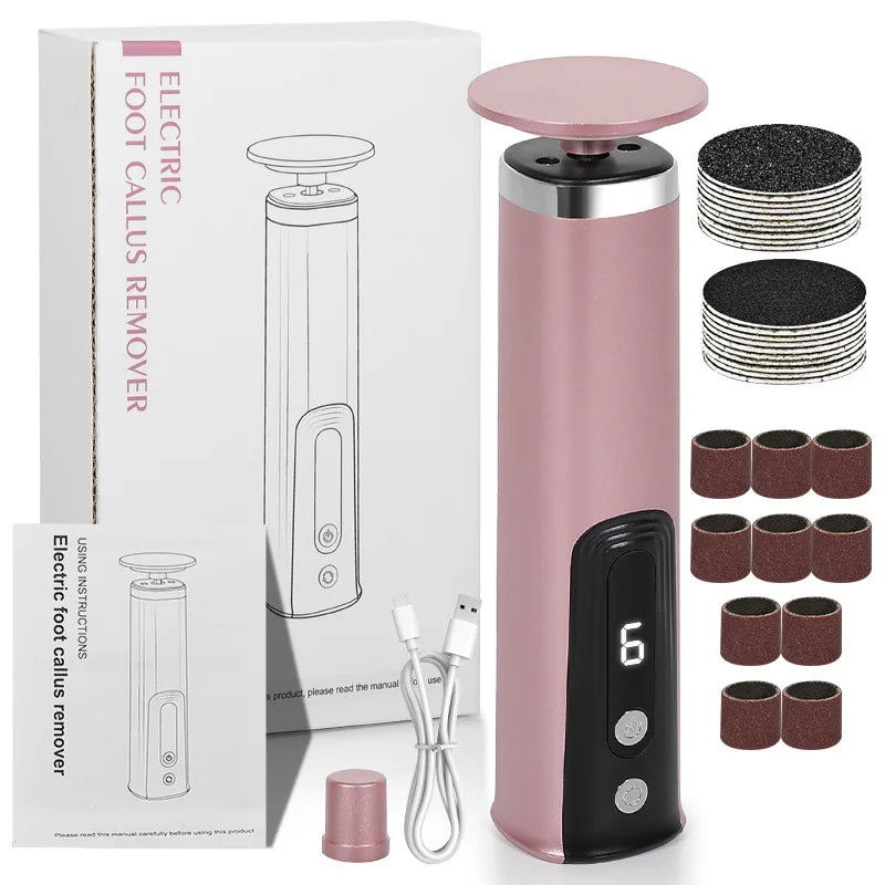 A pink electric foot callus remover device and various replacement pads are shown in a box.