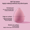 A pink makeup sponge with a pointed part, edge arc surface, and bottom arc surface for applying makeup.