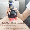 A hand holds a black massage brush with glowing tips, demonstrating the Pulse Micro-Electric Massage Brush.