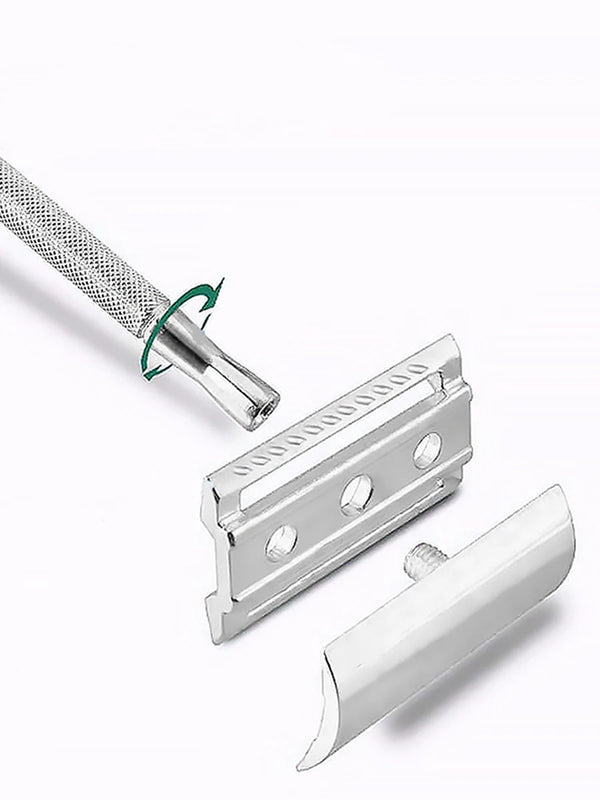 A vintage double edge safety razor kit showing the handle and blade assembly.