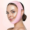 A woman is wearing a pink V-Line face shaping strap designed for the jawline and double chin.