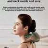 A woman is receiving professional shoulder and neck massage using a green massager on her neck and shoulder.