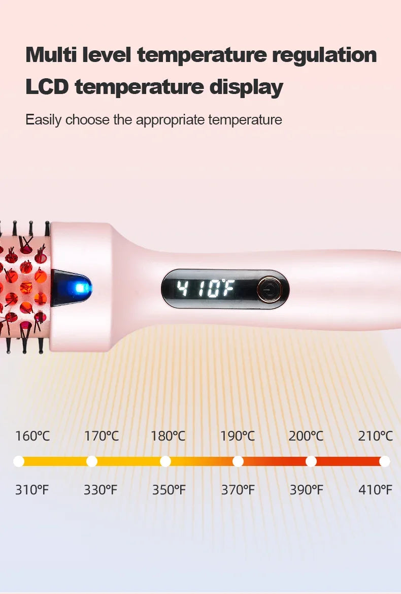 A pink heated hair brush displaying a temperature of 410F, with a scale showing various temperatures.