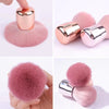 Un set de pinceaux pour nail art en forme de champignons, finitions métalliques rose et argent.