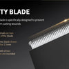 Close-up view of a safety blade on a grooming trimmer showing guardrails and rounded teeth.