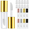 Set of refillable clear lip gloss tubes with gold accents and white brush applicator for DIY cosmetics