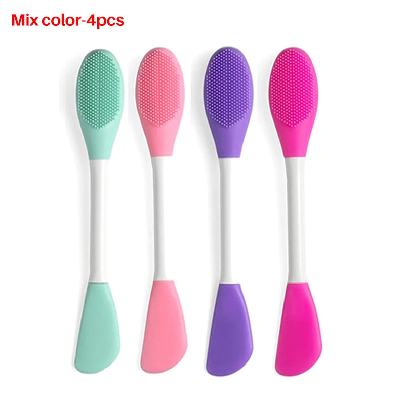 Four silicone facial brushes in green, pink, purple, and magenta for exfoliation