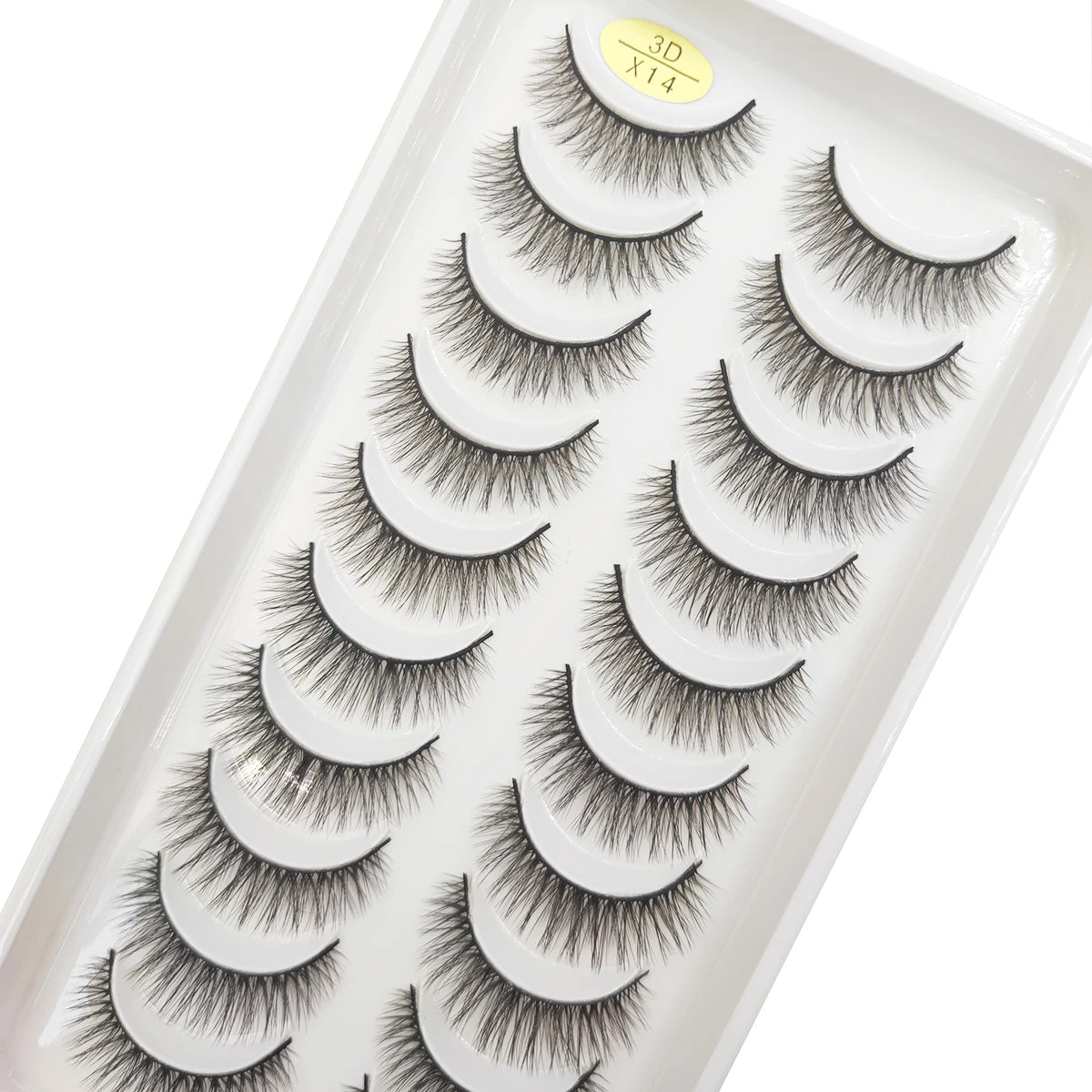 A tray of natural 3D mink false eyelashes is displayed, showing various lash styles.
