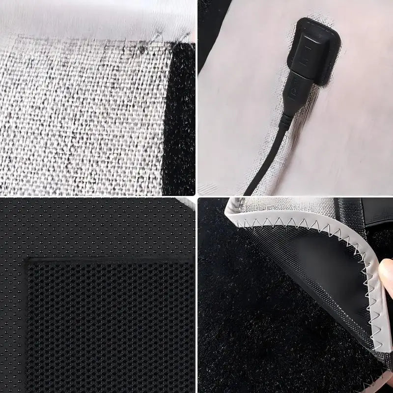 Close-up view of a black heating pad with textured fabric and a black cord.