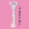 A white replacement shaving blade set with a pink handle and a clear protective cover, shown against a pink background.