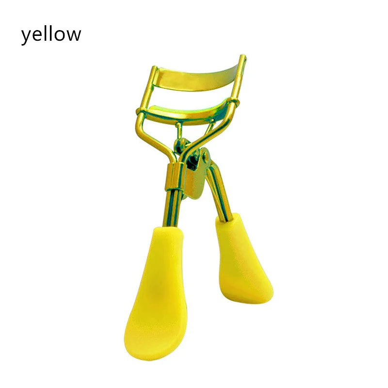 A set of yellow professional eyelash curlers with gold-colored metal handles.