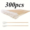 300 pieces of precision wooden cotton swabs arranged in a fan shape.